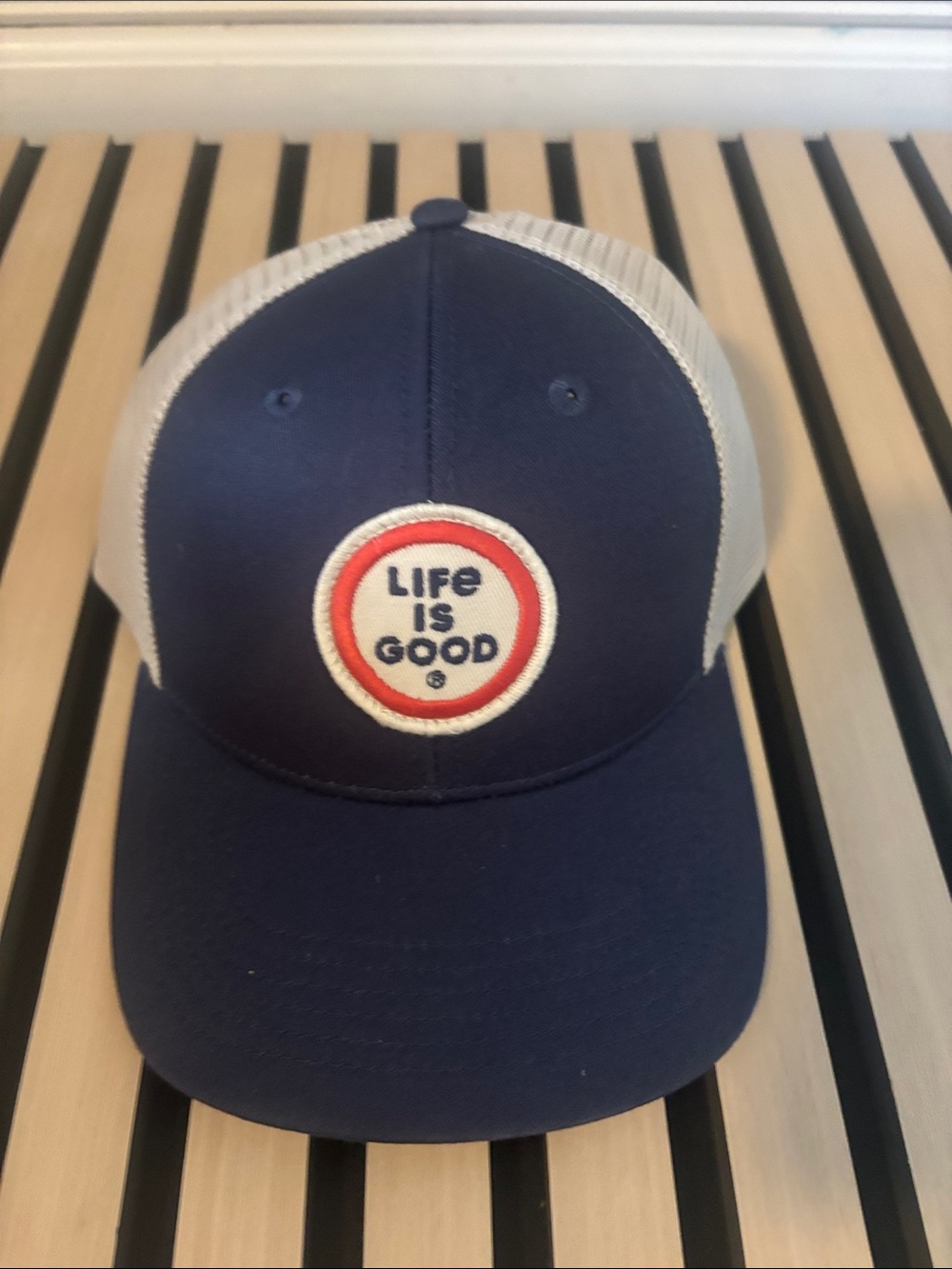 Life Is Good Navy and Cream Mesh Trucker Cap with Red Logo